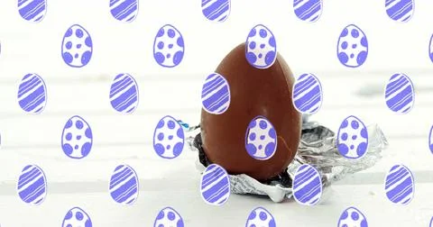 Blue decorative easter eggs in seamless pattern against close up of a easter egg Stock Photos