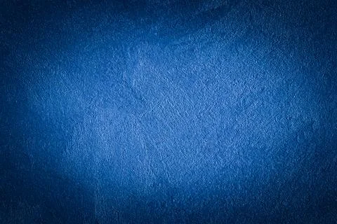 Blue decorative plaster texture with vignette. Abstract grunge background w.. Stock Photos