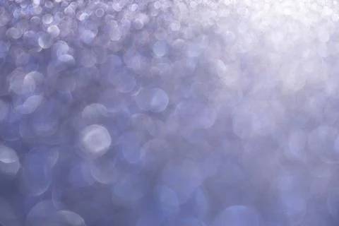 Blue defocused glitter background Stock Photos