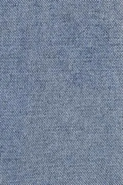 Blue denim fabric texture background. Close up of woven jeans cotton material 写真素材