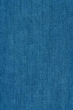 Blue denim fabric texture background. Close up of classic jeans material wi.. Fotos de archivo