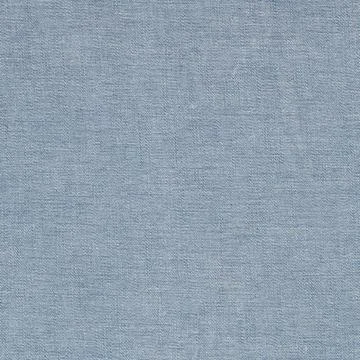 Blue denim fabric texture close up. Woven cotton material background for fash Stockfoto's