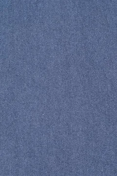 Blue denim fabric texture with diagonal weave pattern Stock Photos
