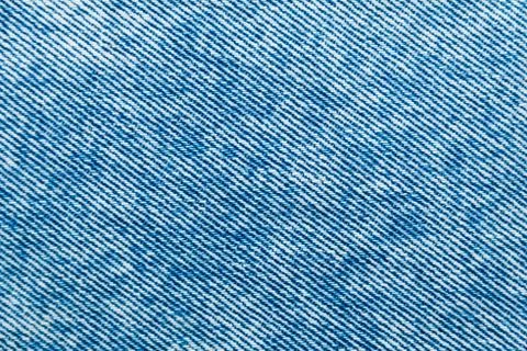 Blue denim fabric texture. simple jeans background Stock Photos
