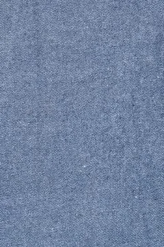 Blue denim fabric texture surface. Classic jeans material background. Cotton  库存照片
