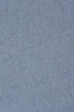 Blue denim fabric texture surface. Close up of woven jeans cotton material... Stock Photos