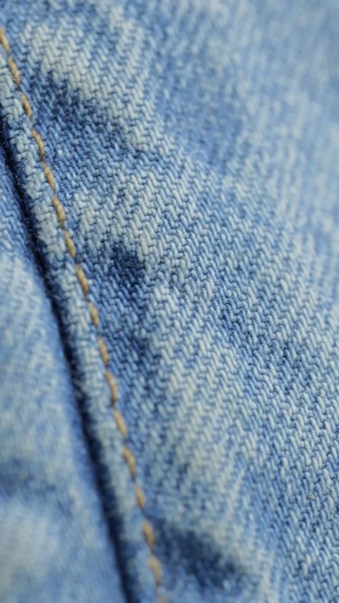 Blue denim jean fabric texture close-up Stock Footage 340926878