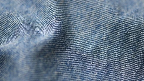 Blue denim jeans background, cotton jean fabric texture, textile backdrop Vídeo Stock 346601848
