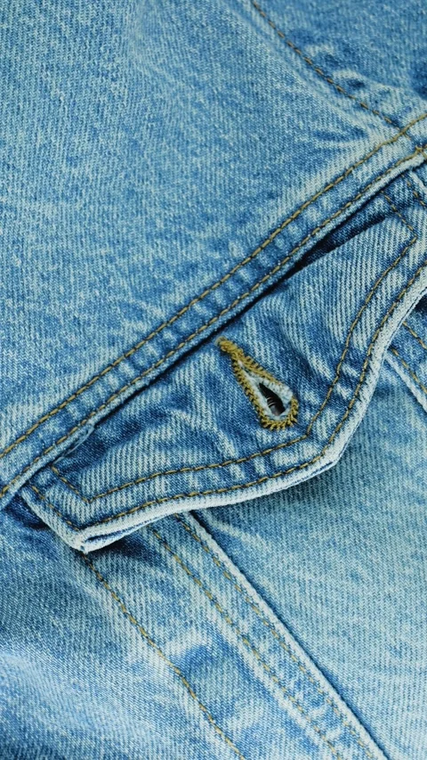 Blue denim jeans fabric texture background Video stock 340926524