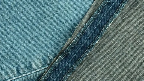 Blue denim jeans fabric texture detail Stock Footage 340926639
