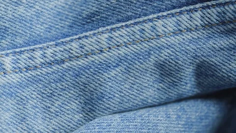 Blue denim jeans fabric texture background Stock Footage 340926749