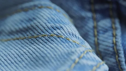 Blue denim jeans fabric texture macro view Stock Footage 340926791