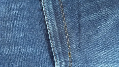 Blue denim jeans fly slow rotating. Jeans texture, fabric background Video stock 101466679