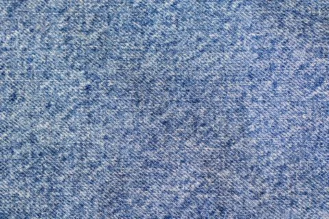Blue denim texture in full screen close-up. Modern coloring. Photo for design Stock Photos