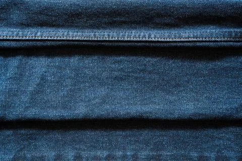 Blue Denim Texture with two Horizontal Folded Lines Stock Photos