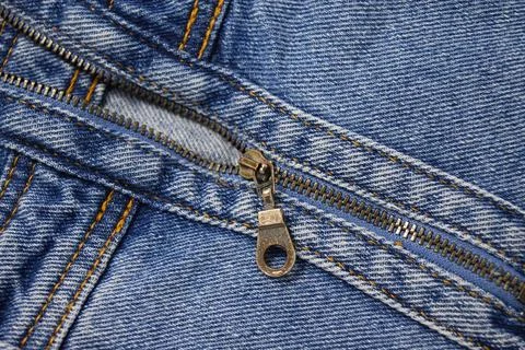 Blue denim with a zipper Stock Photos