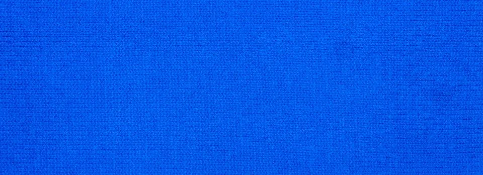 Blue dense fabric texture.Blue fabric background. Stock Photos