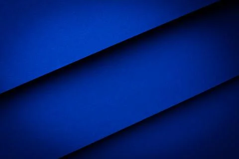 Blue diagonal stripes create a bold and simple background for various desig.. Stock Photos