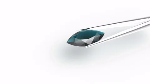 Blue diamond in tweezers Stock Footage 70965381
