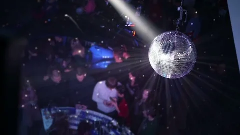 Blue disco ball effect and reflection on the wall. Disco Ball rotation, Party Stock Footage 83751927