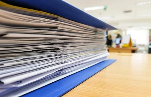 Blue Document file and Paper Document on Office background. Stock Photos
