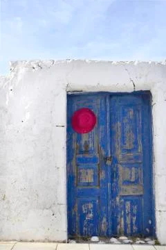 Blue door with hat Fotos Stock