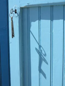 Blue door key Stock Photos