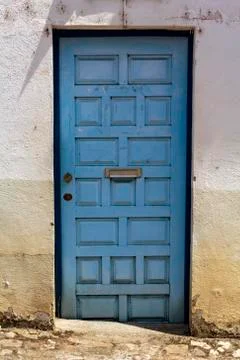 Blue door with mailbox Stock Photos