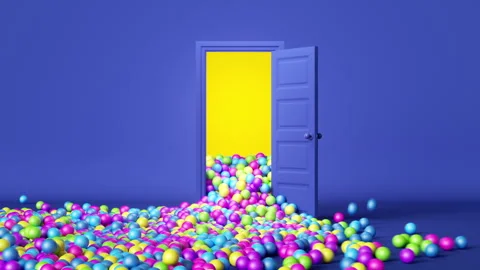 A blue door opens and many little multicolored balloons and balls fall out Stock Footage 250453760