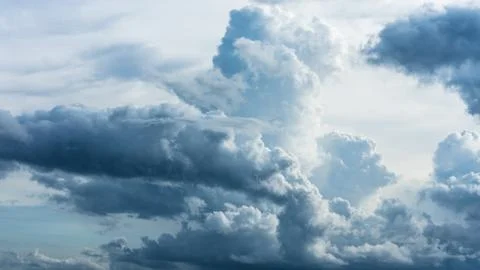 Blue dramatic clouds Stock Photos