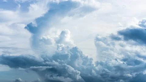 Blue dramatic clouds Stock Photos