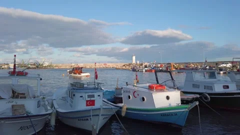 Blue dramatic sky, clouds. Private yachts, fishing boats docked in sea bay. Stock Footage 145769453