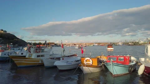 Blue dramatic sky, clouds. Private yachts, fishing boats docked in sea bay. Stock Footage 145769454