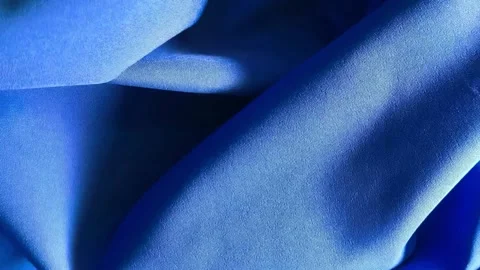 Blue draped fabric motion background, flowing textile texture and elegant design Stock Footage 335581612