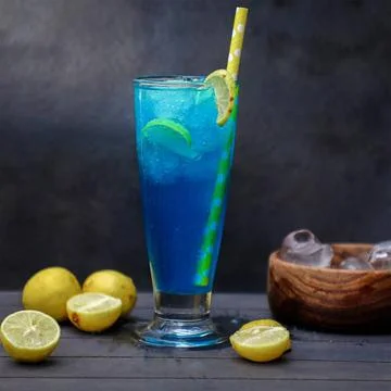 Blue drink with lemon Stock Photos