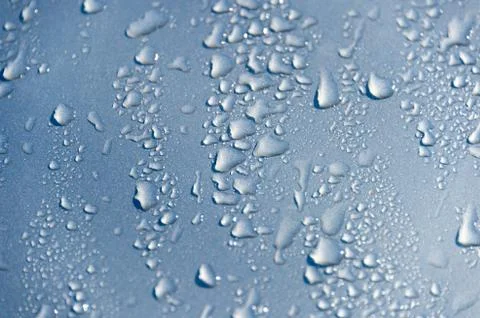 Blue drop of water drops background Stock Photos