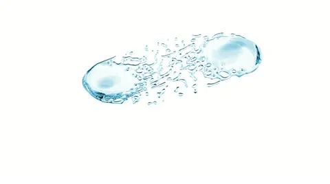 Blue Drops collision in slow motion closeup. White background. HD 1080. Stock Footage 22034915
