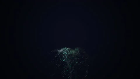 Blue dust sparkles on the dark background. Stock Footage 131157248