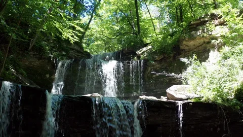 Blue Earth River Triple Falls waterfall 4K aerial fly up Stock Footage 128405138