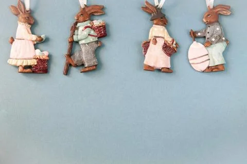 Blue Easter Background - Four Toy Hares with Gifts Stock Photos