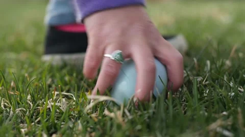 Blue Easter egg on the grass Video stock 145365193