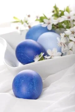 Blue easter eggs in bowl Stock Photos