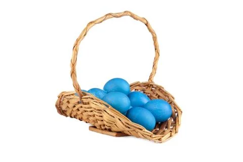 Blue easter eggs inside the basket Stock Photos
