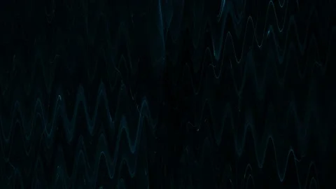 Blue eerie light pattern floating slowly on black background Stock Footage 213213336