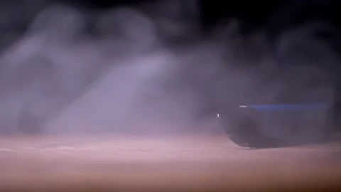 Blue Electronic Cigarette Lying In Thick White Smoke On Wooden Surface Vídeos de archivo 330115665