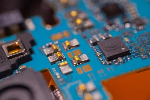 Blue electronic circuit board with microchip, soldered components, gold con.. Stock Photos