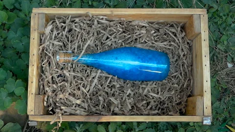 Blue Elixir in a Bottle in a Box Stock Footage 93313126