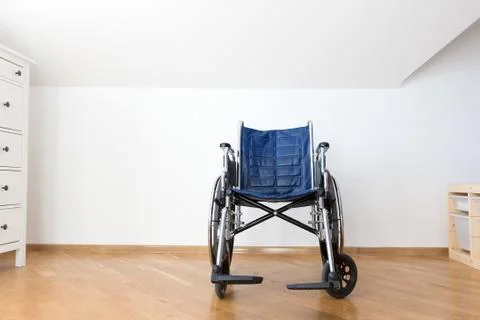 Blue empty invalid chair. Stock Photos
