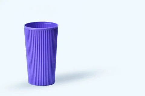 Blue empty plastic cup isolated on white Stock Photos