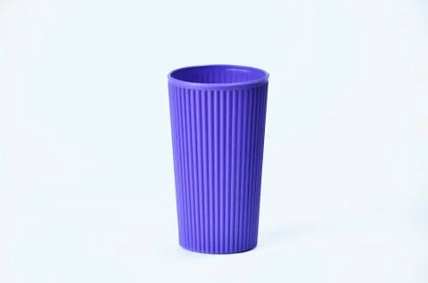 Blue empty plastic cup isolated on white Stock Photos